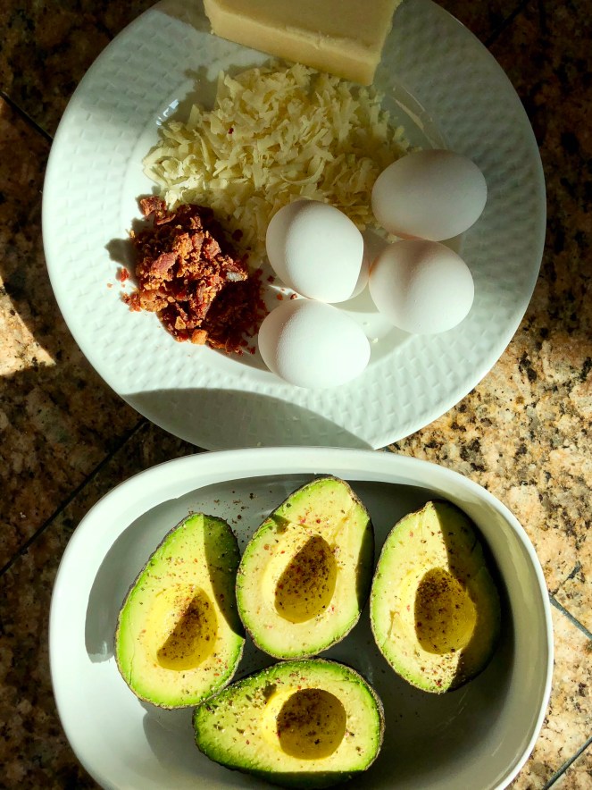 Salt and pepper to taste the split avocados.
